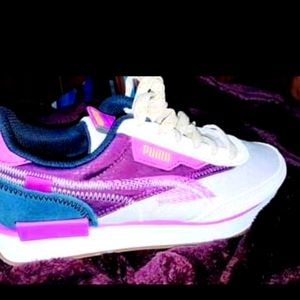 Pumas running shoes brand new 7.5 women's . new with box. White purple